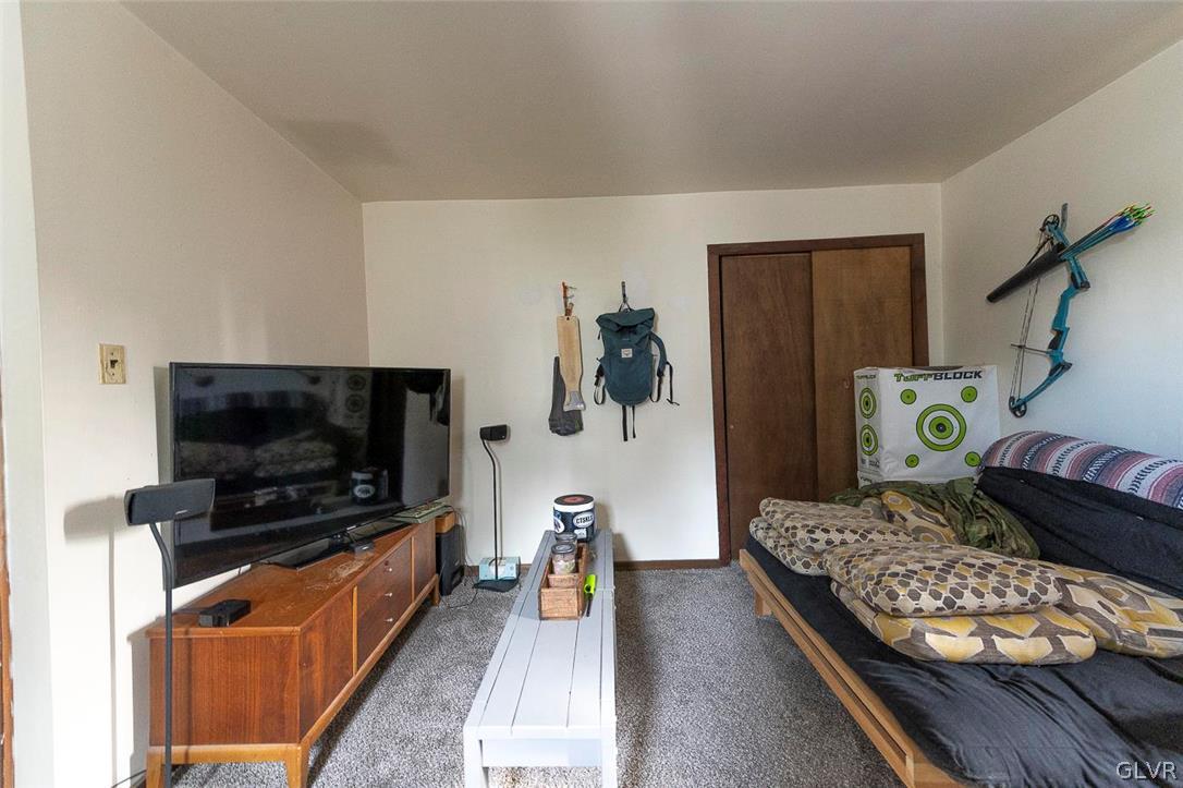 202 Fern Road Riegelsville, PA 18077 - Photo 14 of 18 a living room with furniture and a flat screen tv