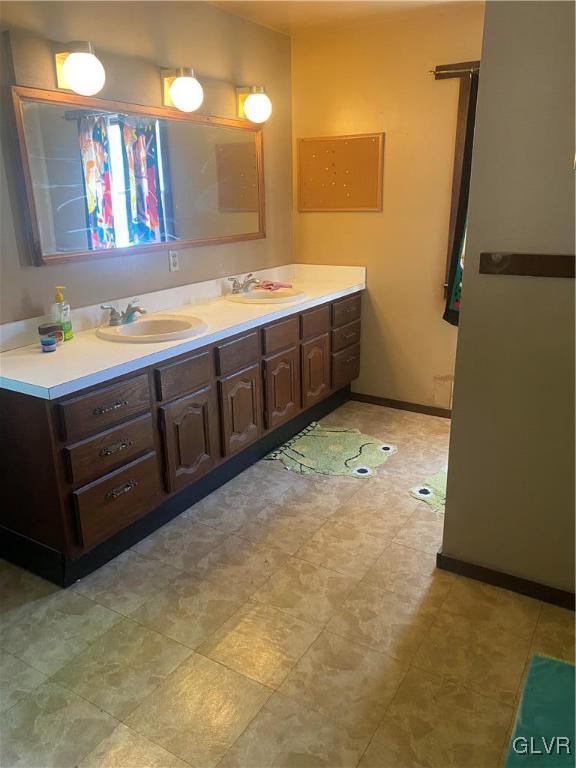 202 Fern Road Riegelsville, PA 18077 - Photo 16 of 18 a bathroom with a sink vanity and mirror