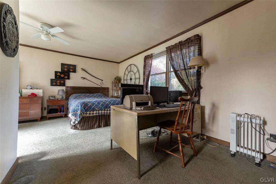202 Fern Road Riegelsville, PA 18077 - Photo 10 of 18 a bedroom with furniture a bed and a window