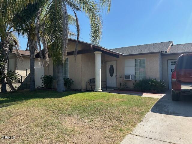 a view of a back yard of the house