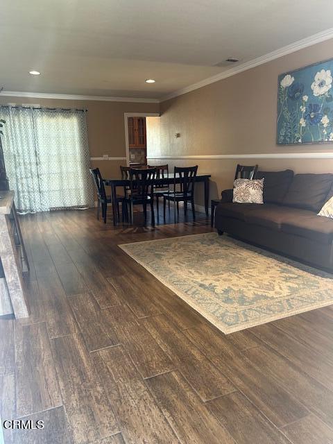 323 Sycamore Street Santa Paula, CA 93060 - Photo 3 of 20 a view of a room with lots of wooden furniture and windows