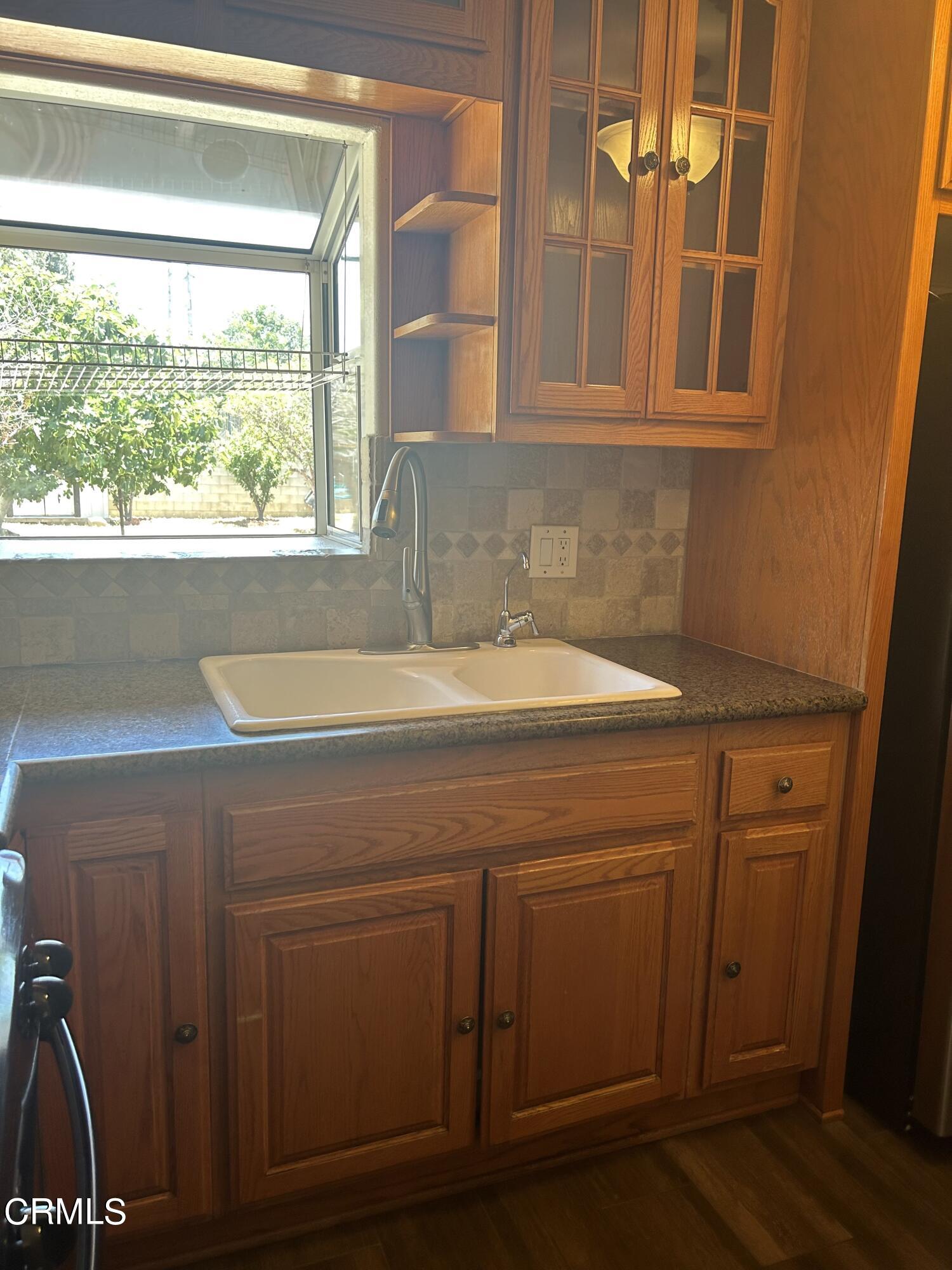 323 Sycamore Street Santa Paula, CA 93060 - Photo 7 of 20 a bathroom with a sink and a vanity