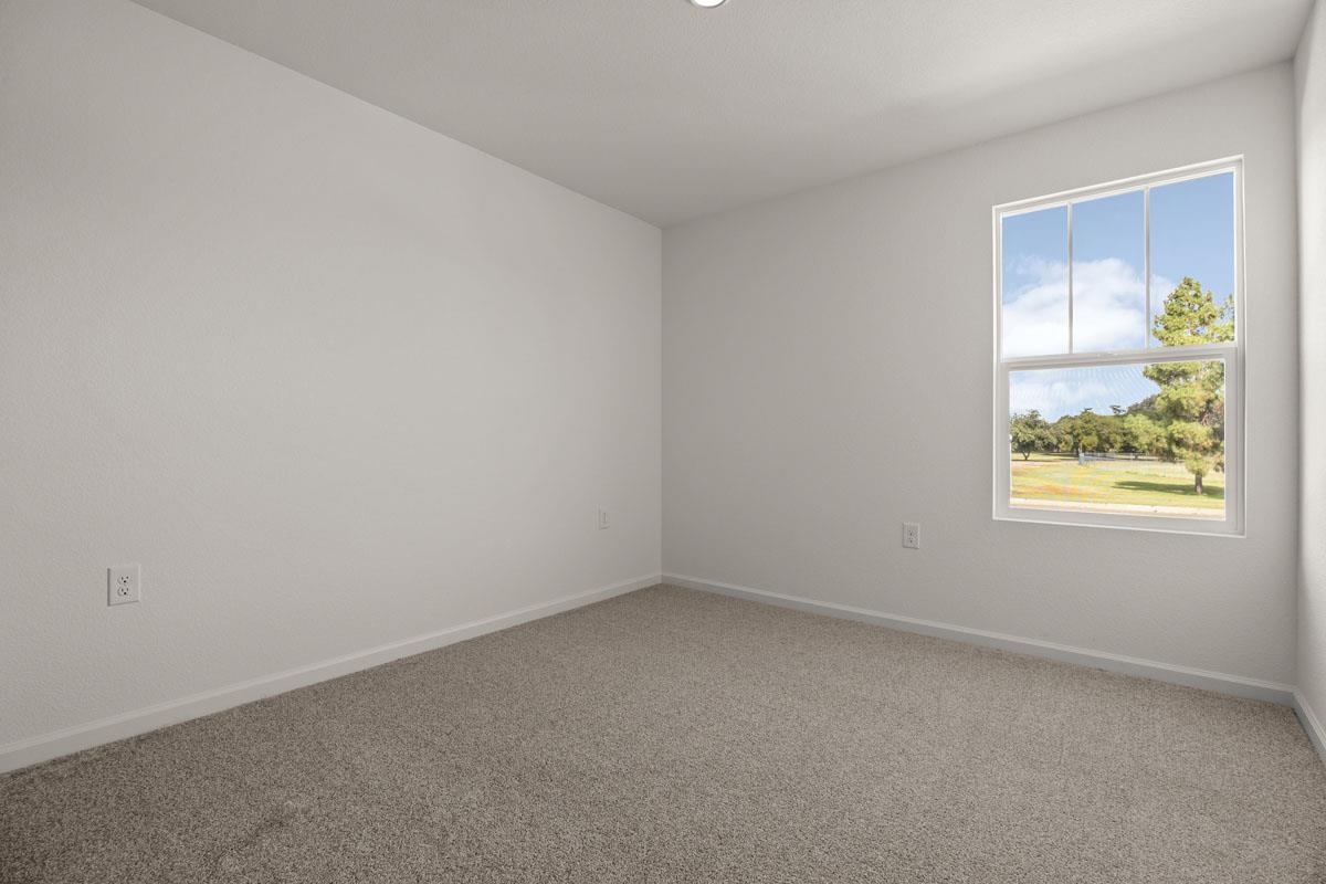 2318 East Loomis Road Stockton, CA 95205 - Photo 14 of 20 an empty room with windows