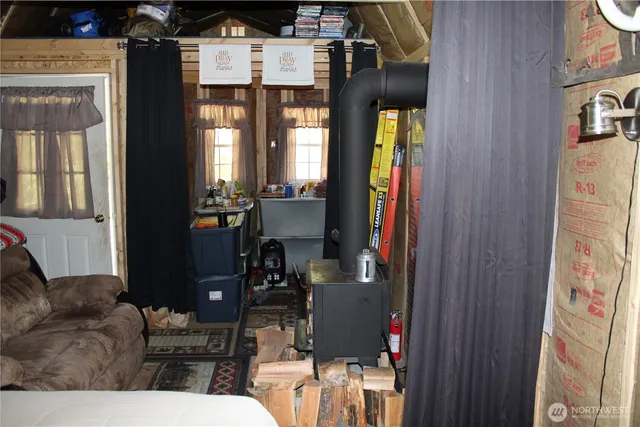 a living room with furniture and entry gate