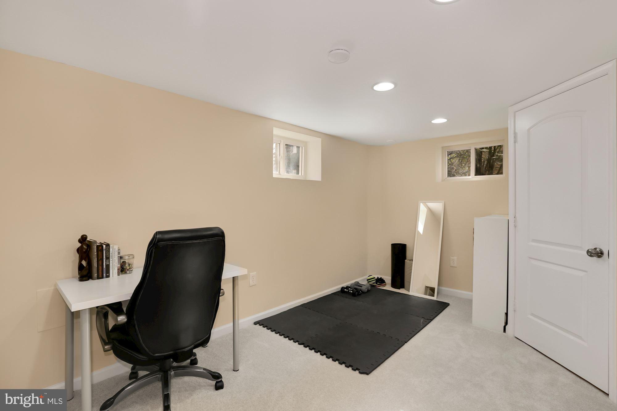10211 Carson Place Silver Spring, MD 20901 - Photo 16 of 33 Lower level desk and exercise corner