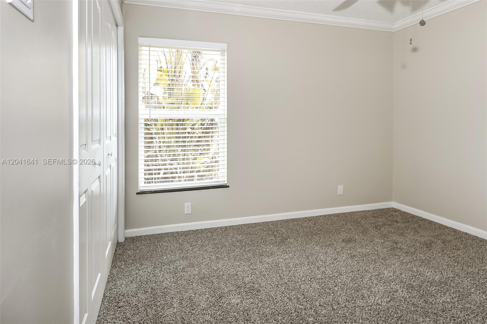 6484 Robinson Street Jupiter, FL 33458 - Photo 10 of 15 a view of an empty room with a window