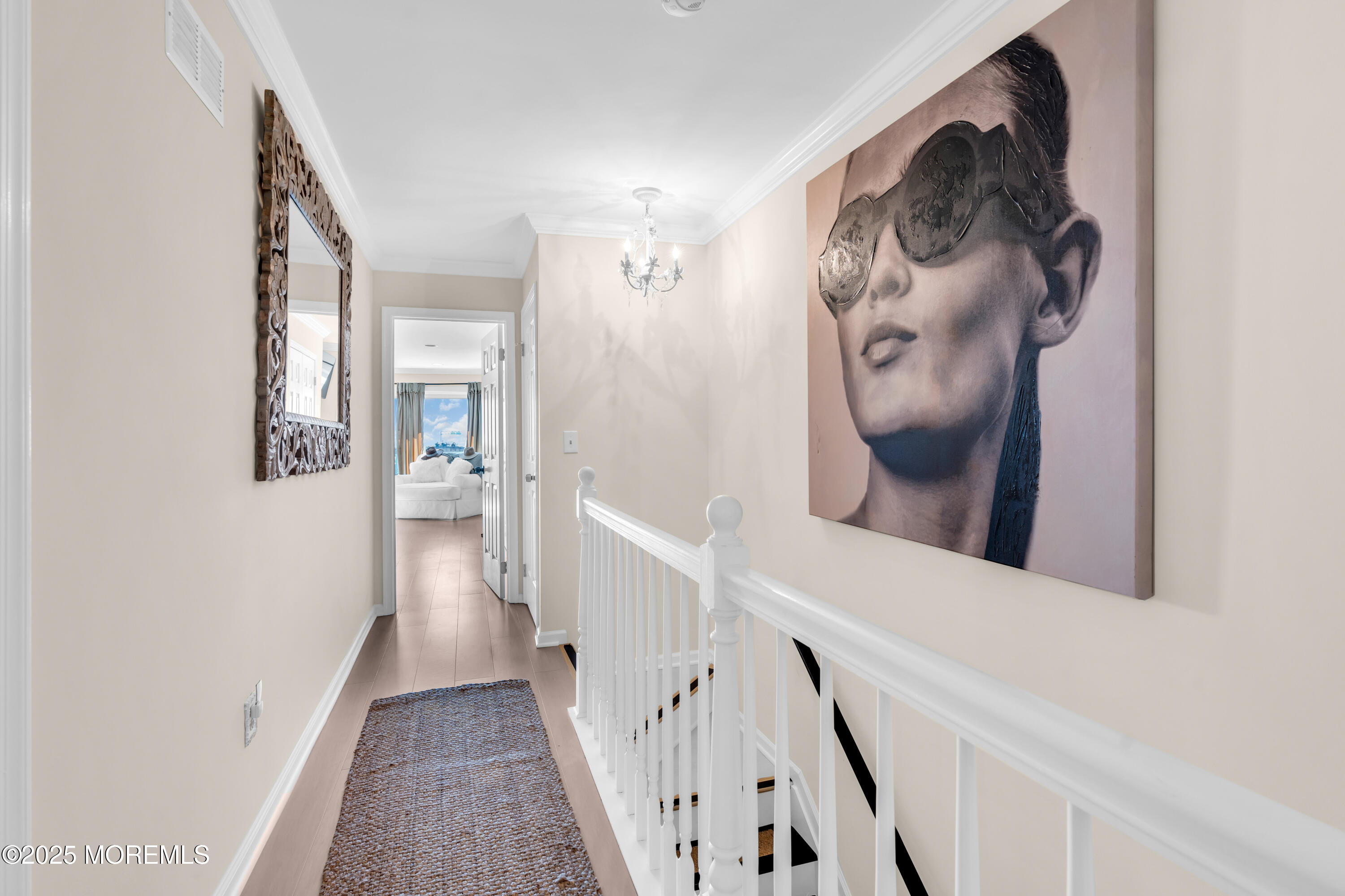 1 Portland Road, Unit 13 Highlands, NJ 07732 - Photo 18 of 40 a view of a hallway with wooden floor and entryway