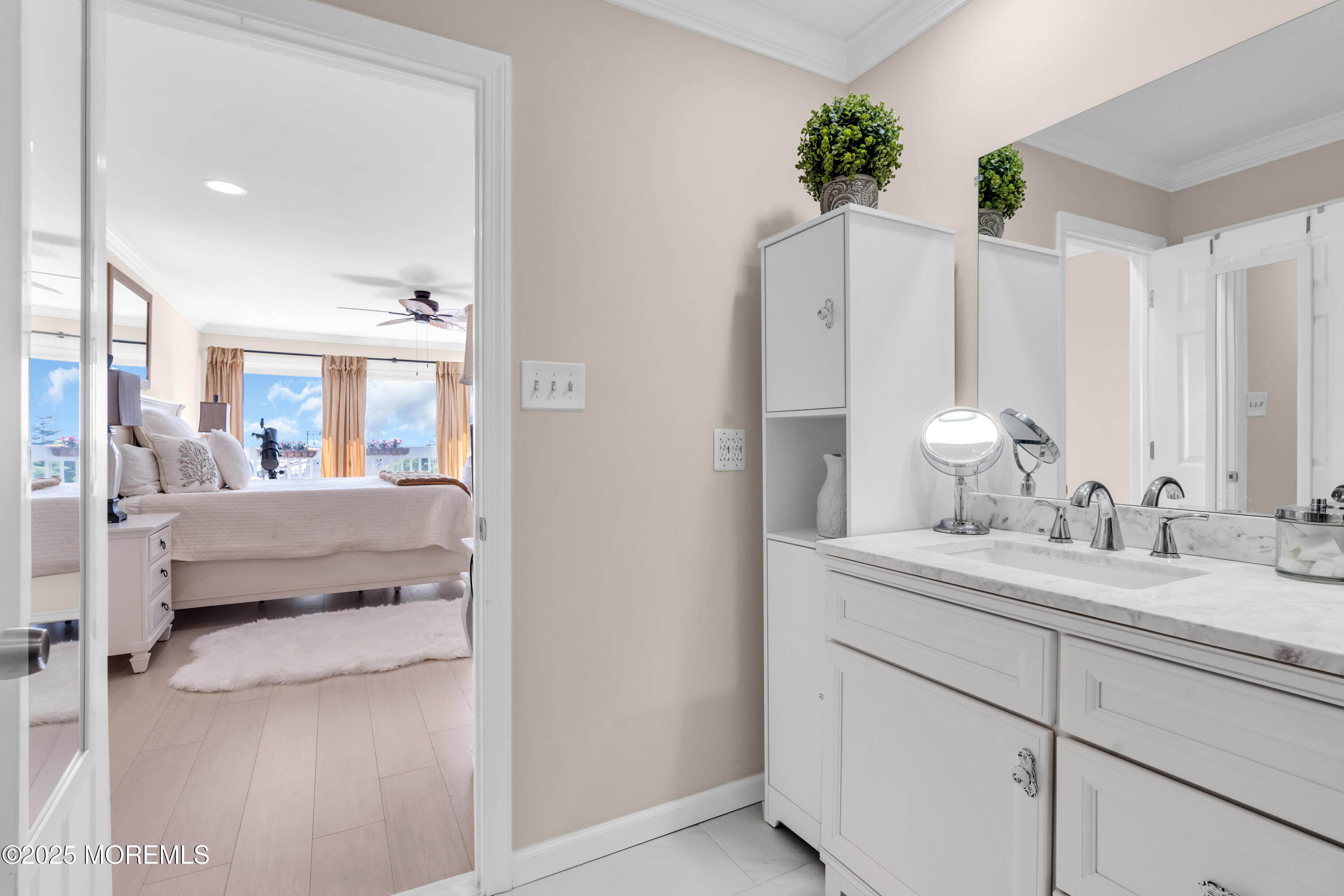 1 Portland Road, Unit 13 Highlands, NJ 07732 - Photo 23 of 40 a en suite bathroom with a double vanity sink and mirror