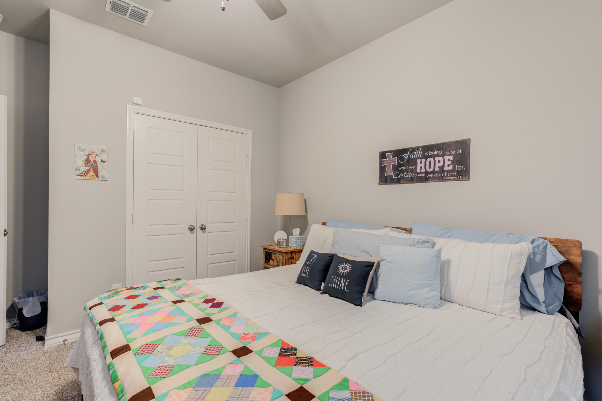 5802 Winfield Avenue Lubbock, TX 79407 - Photo 21 of 36 a bedroom with a bed and a window