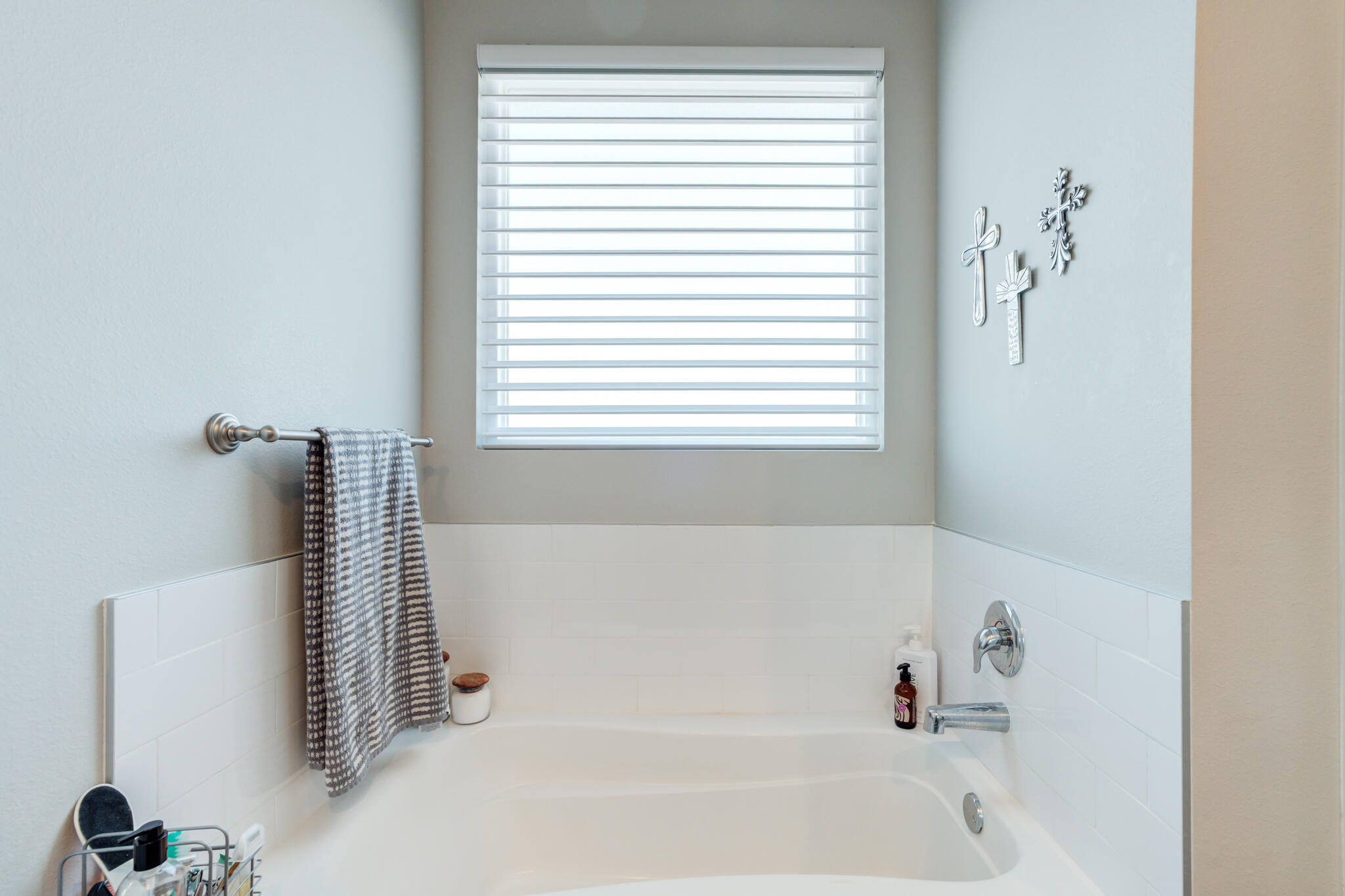 5802 Winfield Avenue Lubbock, TX 79407 - Photo 28 of 36 a bathroom with a bathtub and a shower