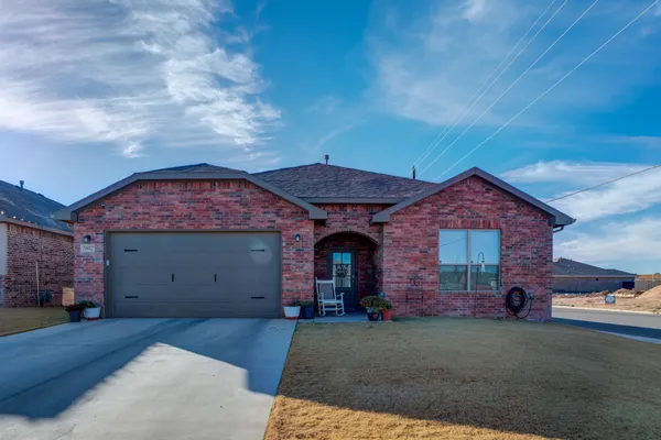 front view of a house with a garage
