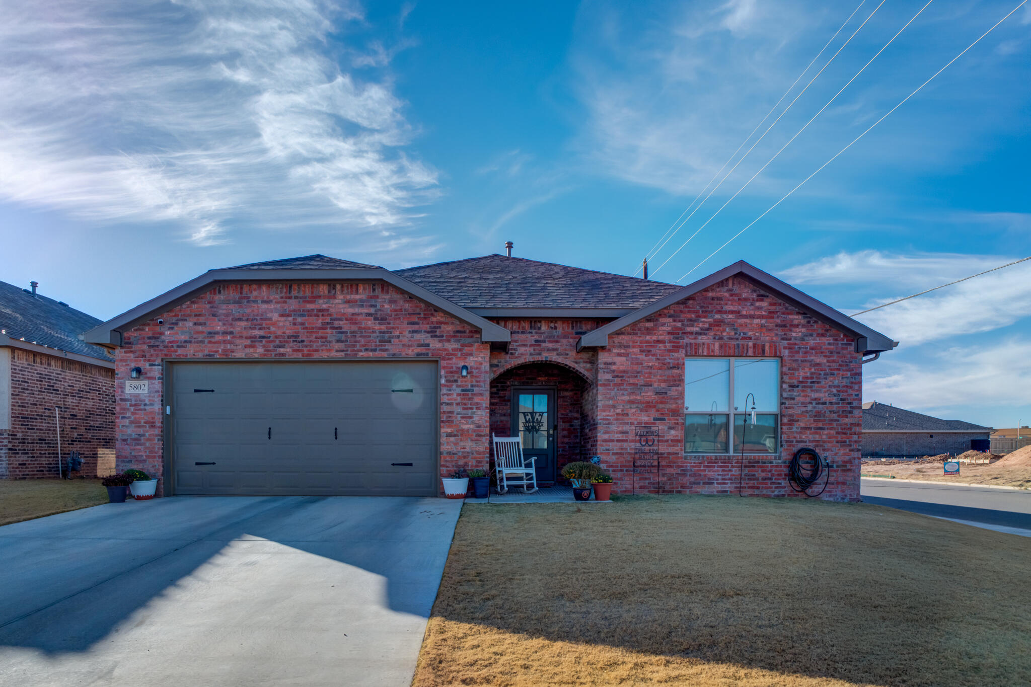 5802 Winfield Avenue Lubbock, TX 79407 - Photo 3 of 36 front view of a house with a garage