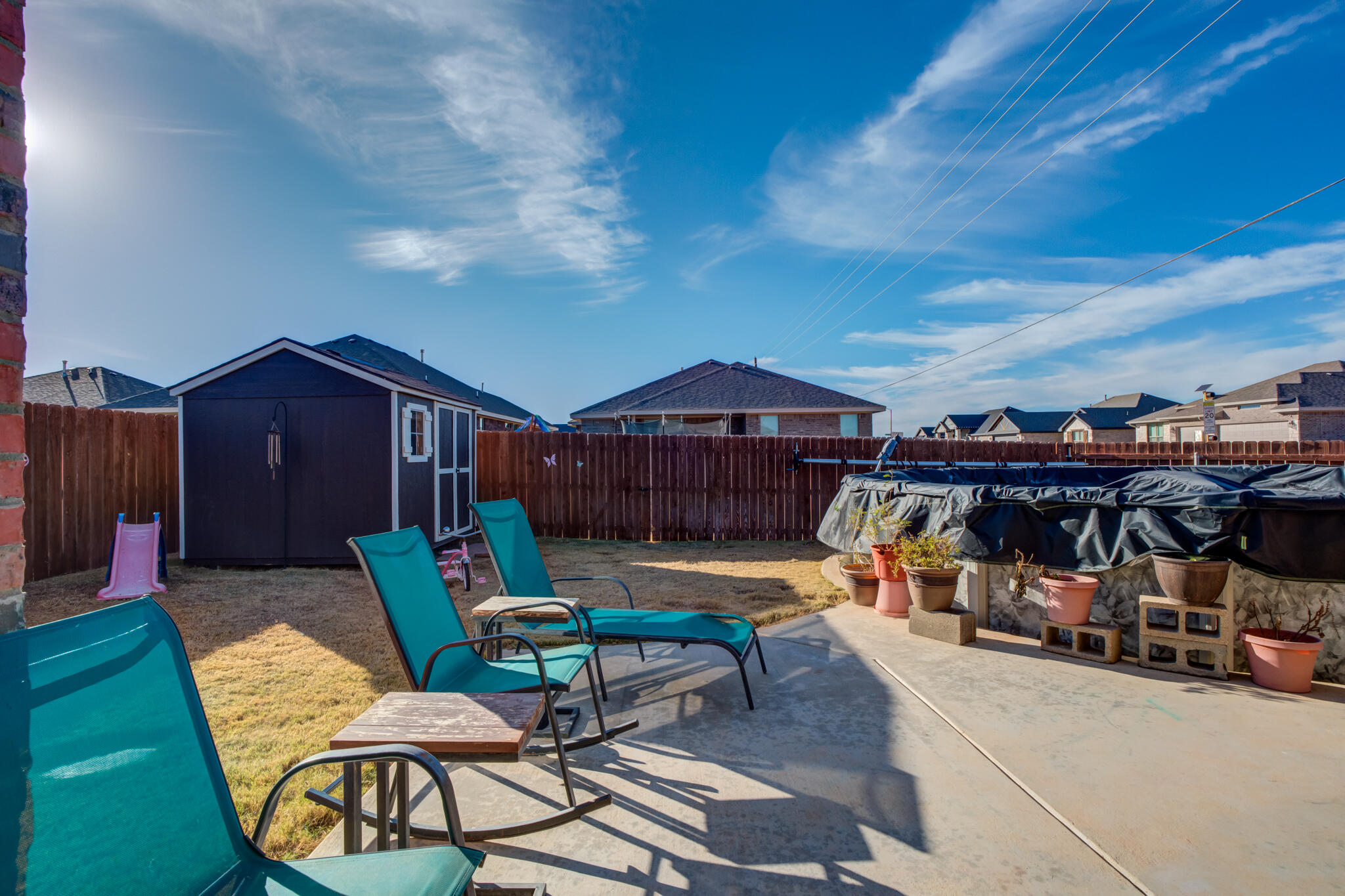 5802 Winfield Avenue Lubbock, TX 79407 - Photo 33 of 36 a outdoor space with patio lots of furniture