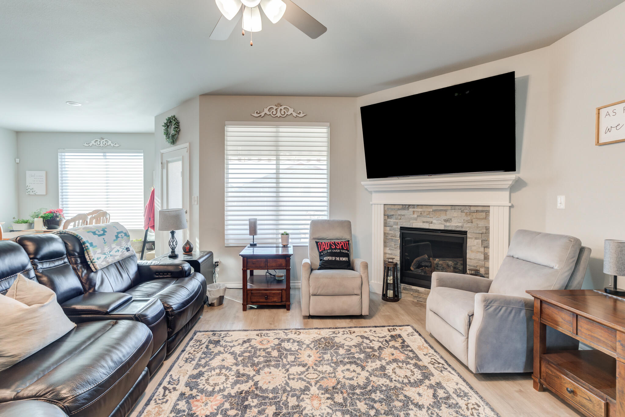 5802 Winfield Avenue Lubbock, TX 79407 - Photo 7 of 36 a living room with furniture fireplace and flat screen tv