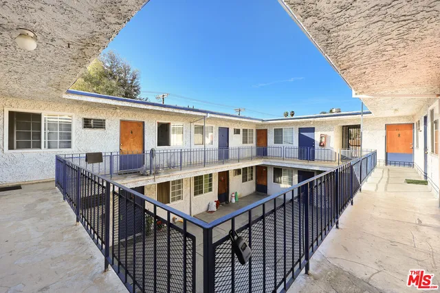 an aerial view of a building with entryway