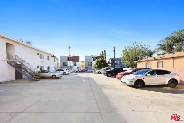 a view of car parked in front of house