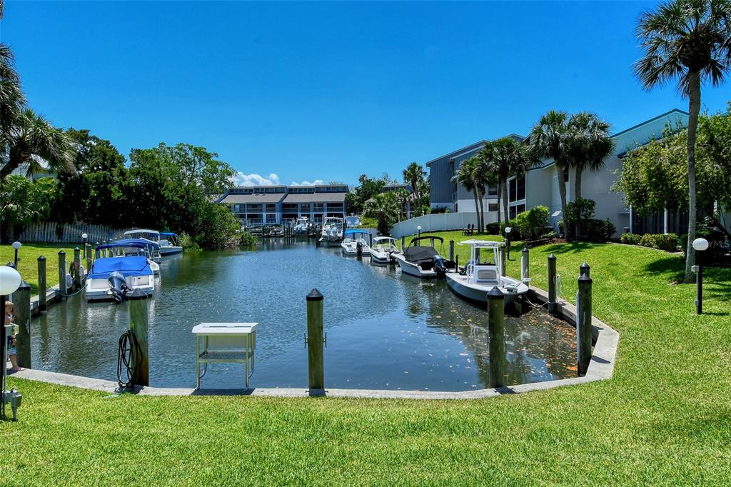5641 Midnight Pass Road, Unit 904 Sarasota, FL 34242 - Photo 20 of 24 a view of a house with a swimming pool