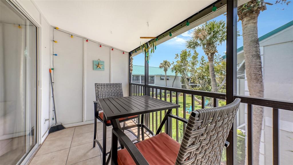 5641 Midnight Pass Road, Unit 904 Sarasota, FL 34242 - Photo 7 of 24 a view of a city from a balcony