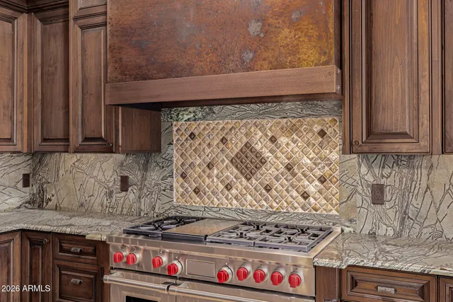 a bathroom with a toilet sink vanity and mirror
