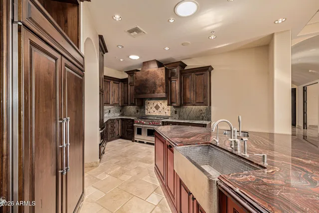 a view of a backyard with sitting area and furniture