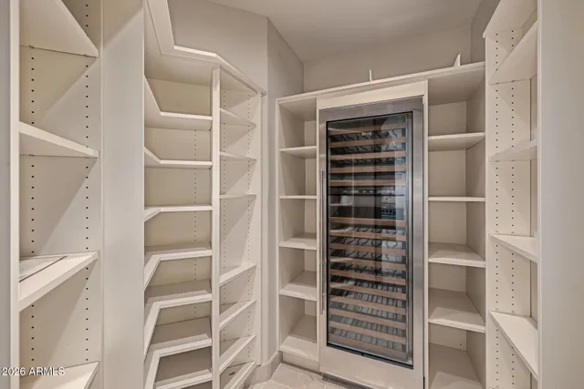 a view of a house with wooden floor and a large window