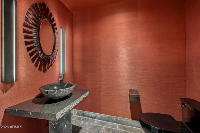 a view of a chairs and table in the patio