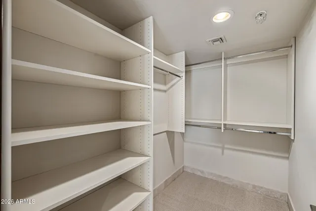 a view of a house with backyard and swimming pool