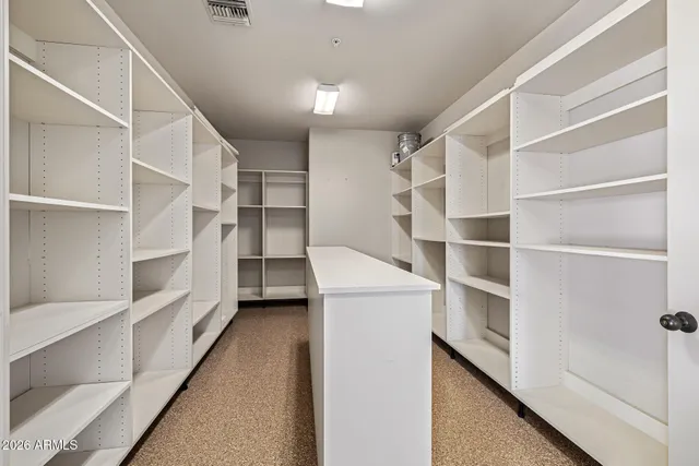 a view of a swimming pool and lounge chair