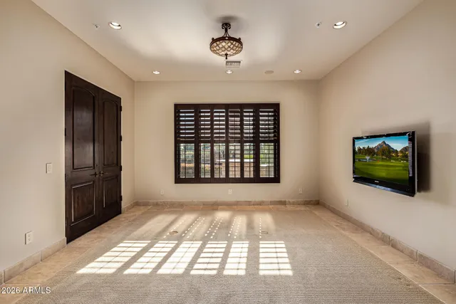 a view of a golf course with a lake