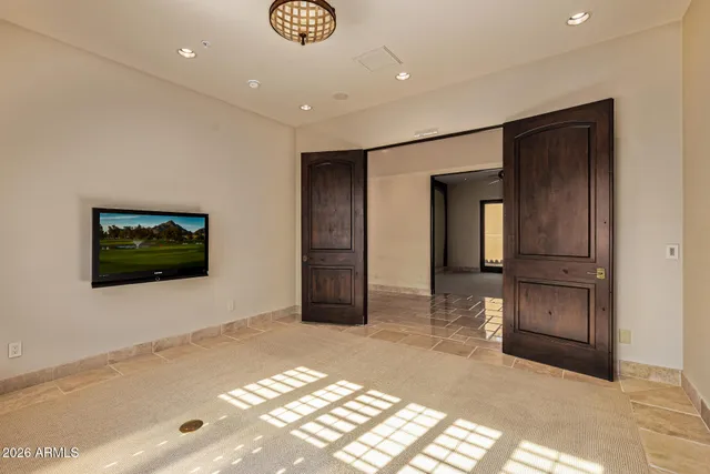 a view of a big yard with lots of green space