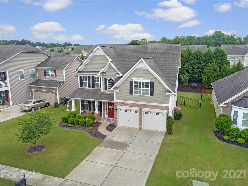 823 Solandra Way Tega Cay, SC 29708 - Photo 2 of 43 a view of house with garden space