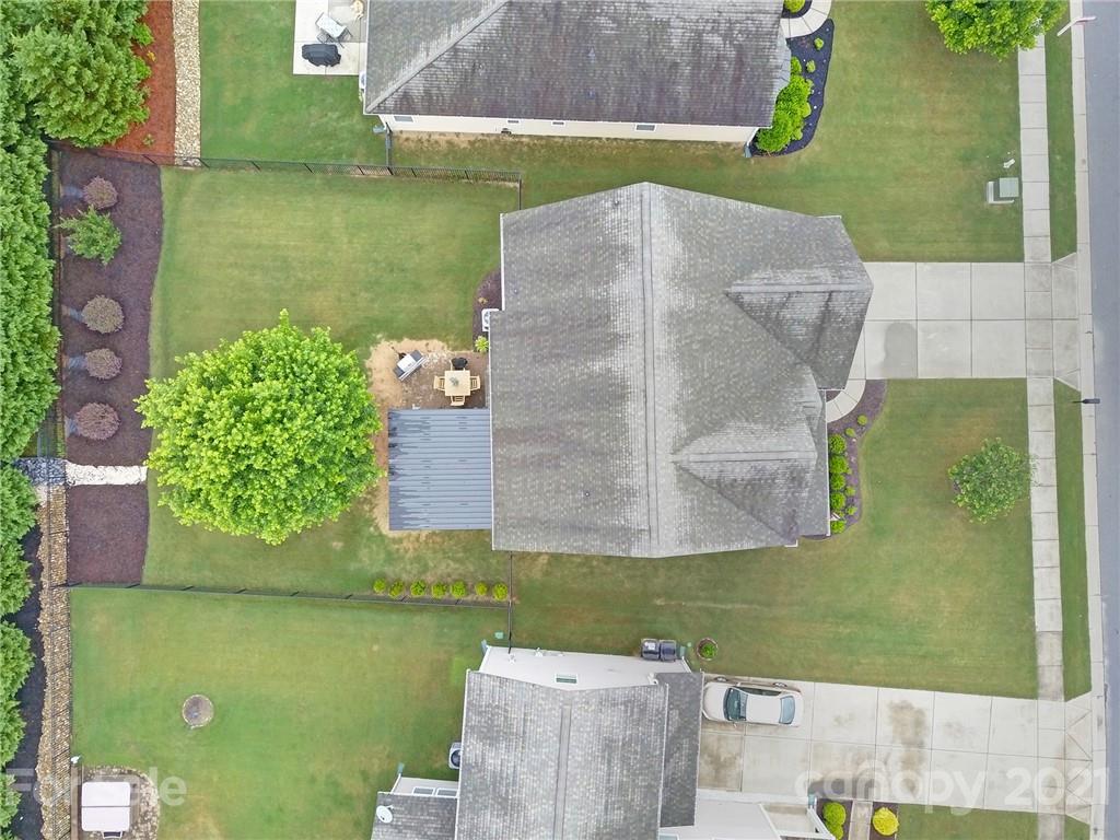 823 Solandra Way Tega Cay, SC 29708 - Photo 4 of 43 an aerial view of a house with a yard