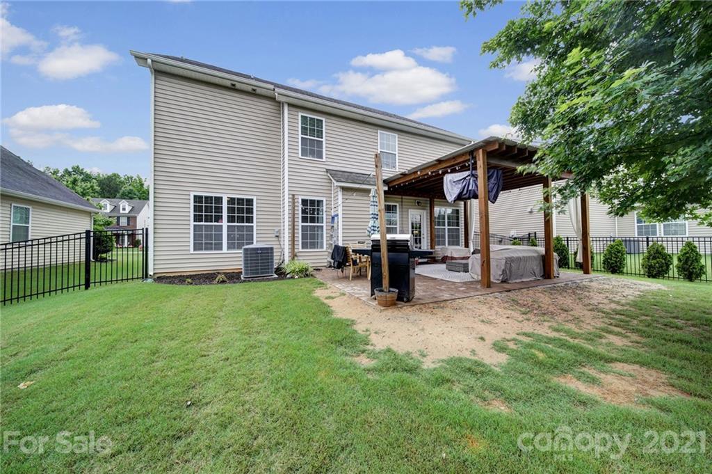 823 Solandra Way Tega Cay, SC 29708 - Photo 41 of 43 a view of a house with a patio