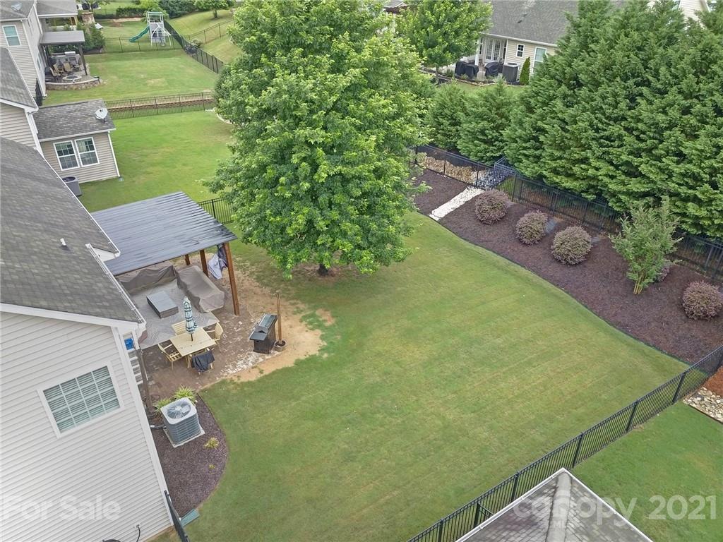823 Solandra Way Tega Cay, SC 29708 - Photo 6 of 43 an aerial view of a house with a yard