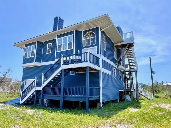 a view of a house with a deck and deck