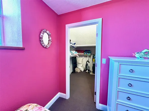 a kitchen with a sink a refrigerator and a stove
