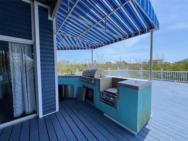 a bathroom with a shower and a sink