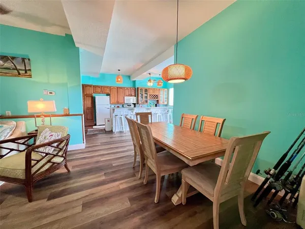 a kitchen with granite countertop breakfast area