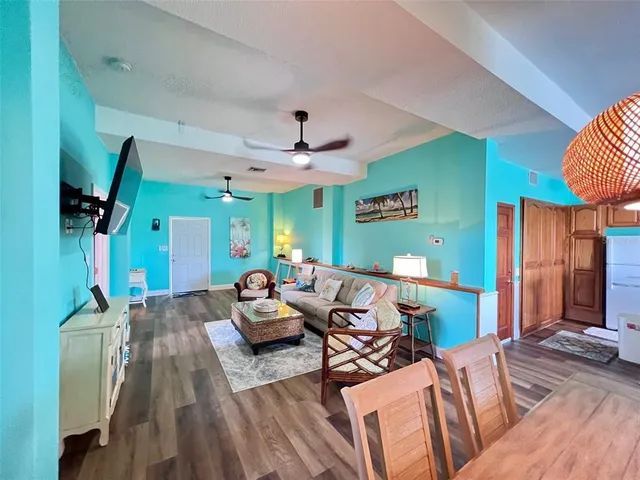 a spacious bathroom with a granite countertop sink and a mirror