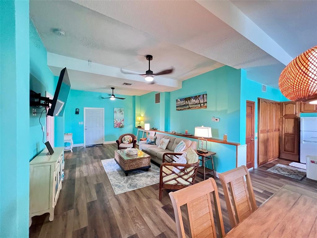 9594 Doubloon Trail Placida, FL 33946 - Photo 10 of 84 a living room with furniture a window and wooden floor