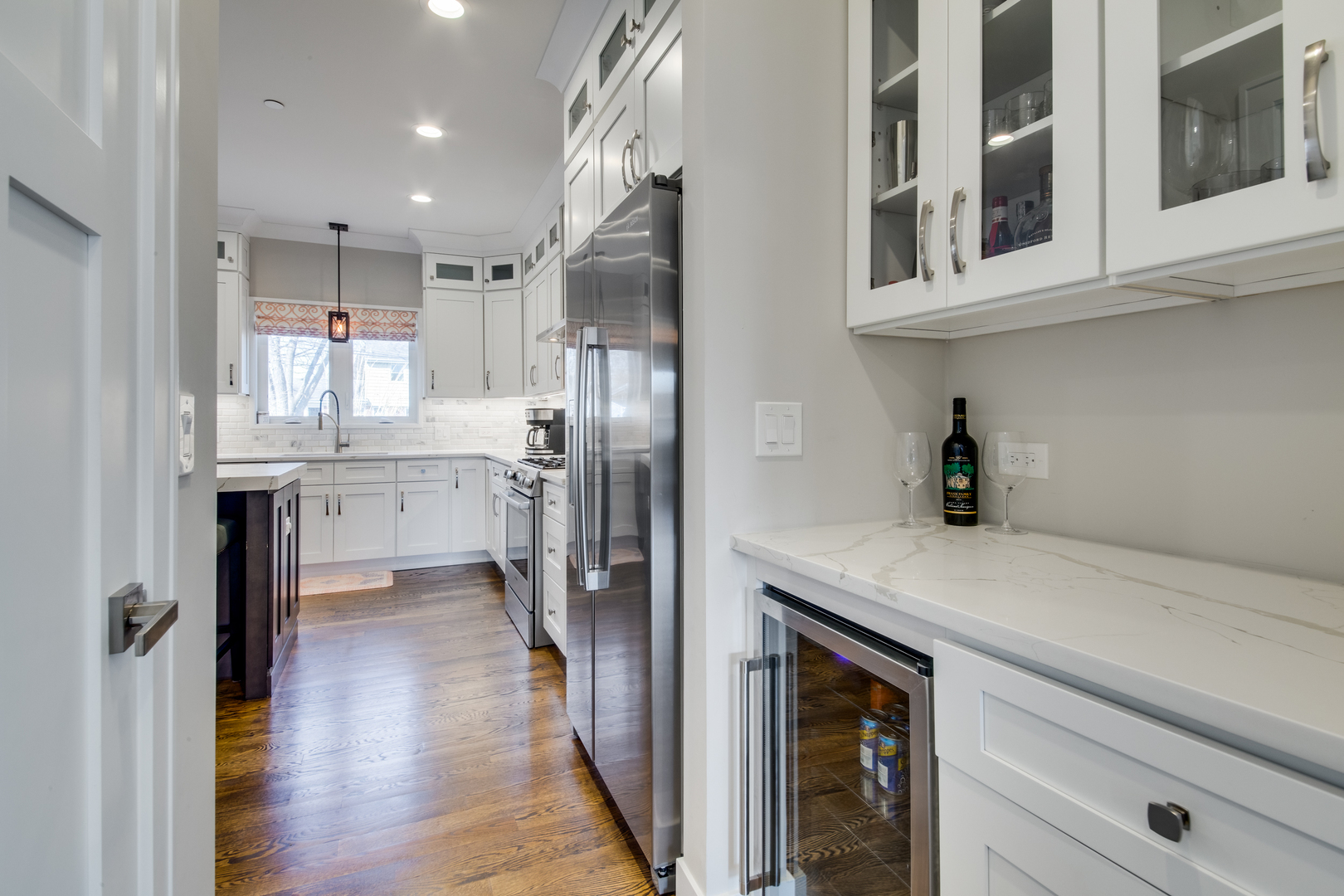 2320 Edna Avenue Park Ridge, IL 60068 - Photo 11 of 41 a kitchen with stainless steel appliances a refrigerator sink and cabinets