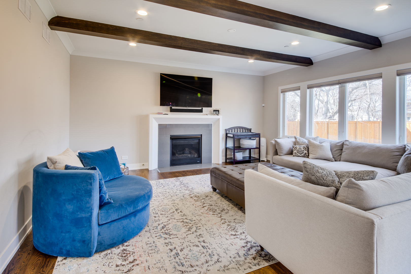 2320 Edna Avenue Park Ridge, IL 60068 - Photo 15 of 41 a living room with furniture and a fireplace