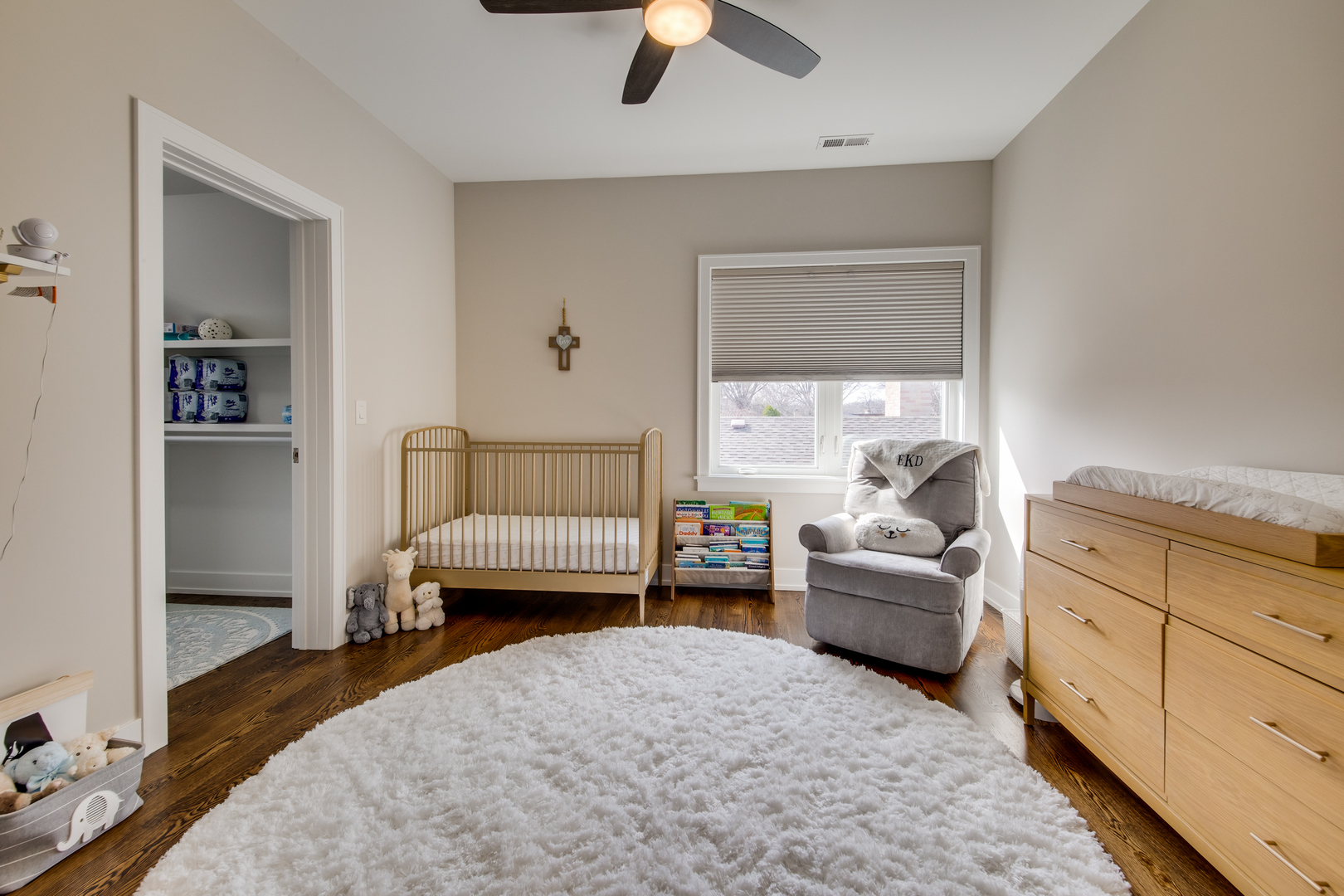 2320 Edna Avenue Park Ridge, IL 60068 - Photo 25 of 41 a bedroom with a bed and a chandelier