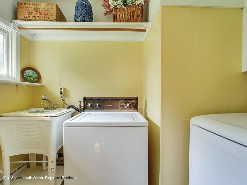 60 Five Points Road Colts Neck, NJ 07722 - Photo 19 of 37 a utility room with dryer and washer