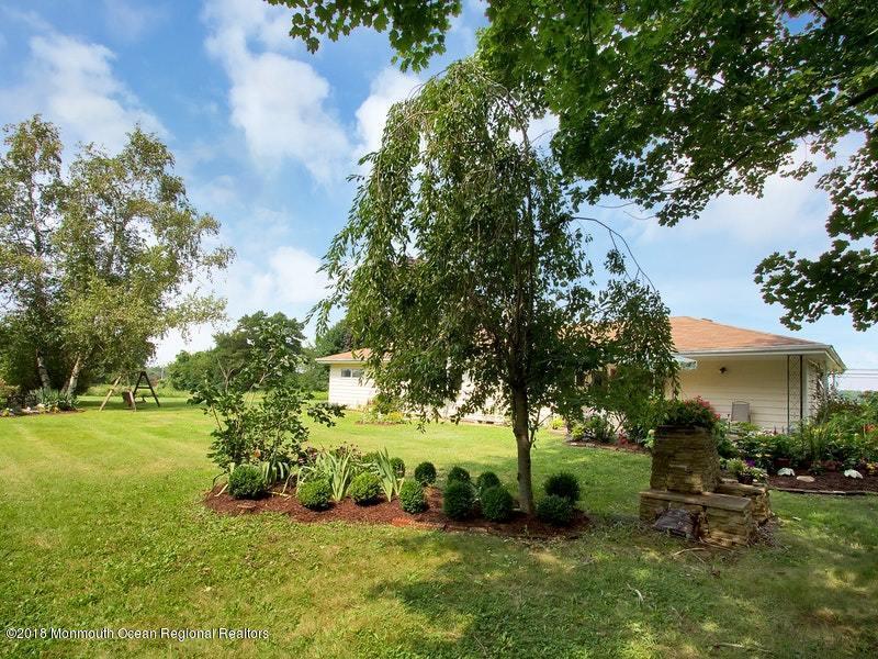 60 Five Points Road Colts Neck, NJ 07722 - Photo 25 of 37 a view of a garden with trees
