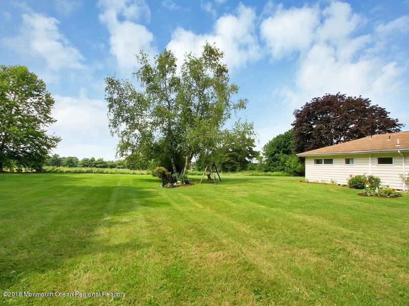 60 Five Points Road Colts Neck, NJ 07722 - Photo 29 of 37 a view of a house with a big yard