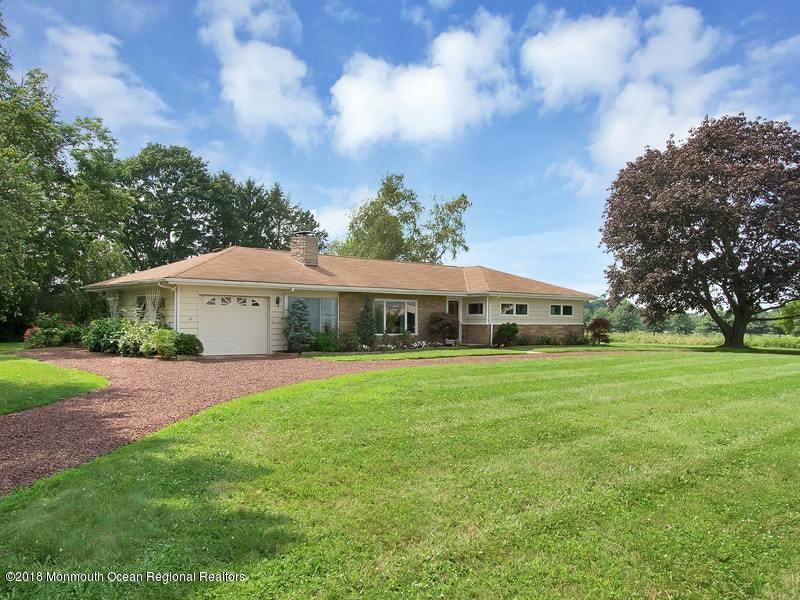 60 Five Points Road Colts Neck, NJ 07722 - Photo 33 of 37 a view of a big house with a big yard