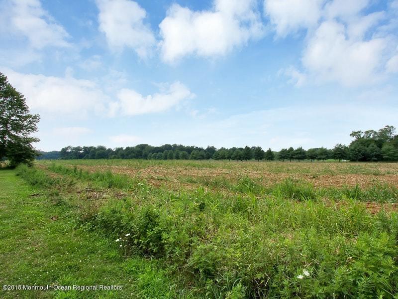 60 Five Points Road Colts Neck, NJ 07722 - Photo 36 of 37 a view of lake with green space