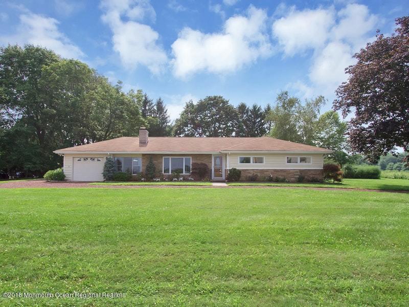 60 Five Points Road Colts Neck, NJ 07722 - Photo 37 of 37 a house view with a garden space