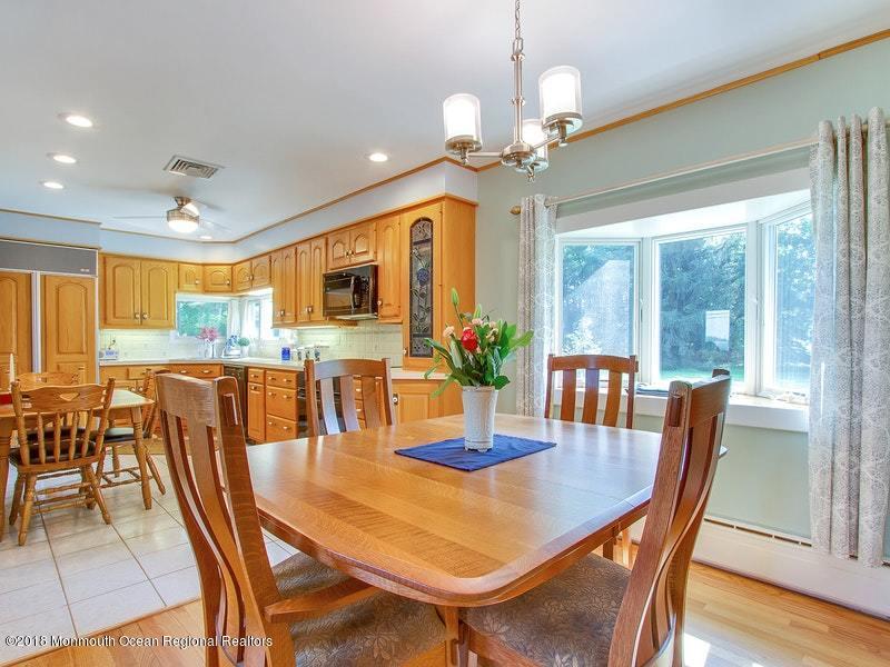 60 Five Points Road Colts Neck, NJ 07722 - Photo 6 of 37 a view of a dining room with furniture window and wooden floor